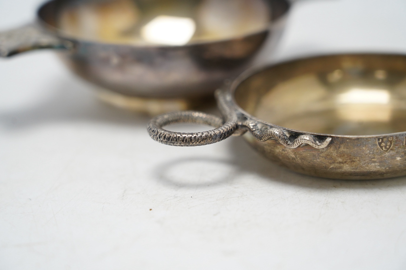 A modern Scottish silver Quaich, Francis Howard Ltd, Edinburgh, 2000, 14.3cm, together with a modern silver taste vin, 8.1oz. Condition - good